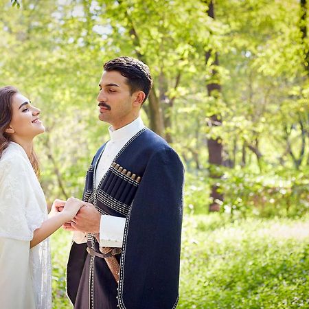 Paragraph Resort & Spa Shekvetili, Autograph Collection Exterior foto Azeri couple in national clothes